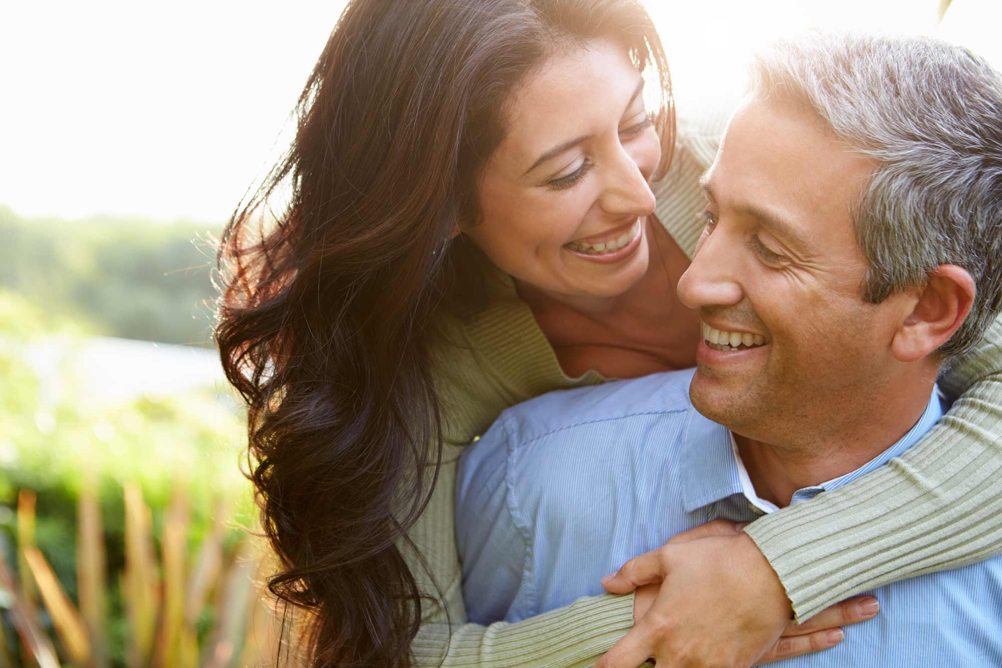 Loving mid aged Couple In Countryside